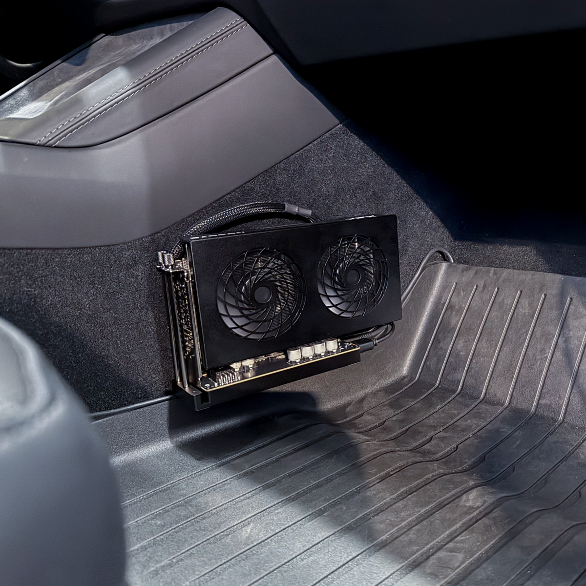 chestnut and GPU mounted in the passenger footwell
